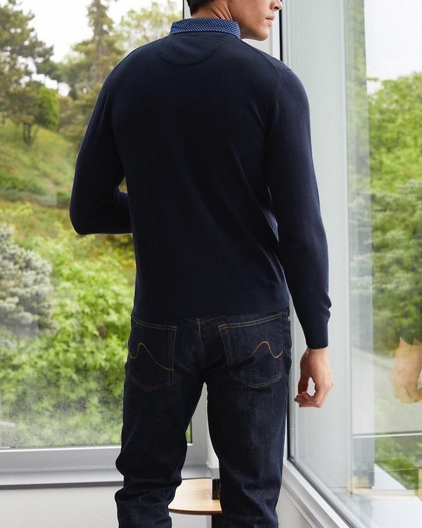 Pull uni manches longues col polo en coton bleu Pull uni manches longues col polo en coton bleu