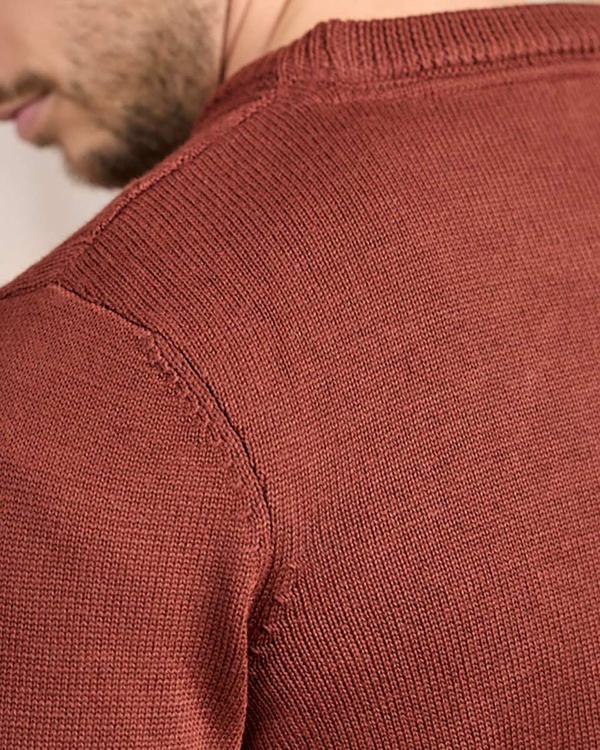 Pull torsadé rouge