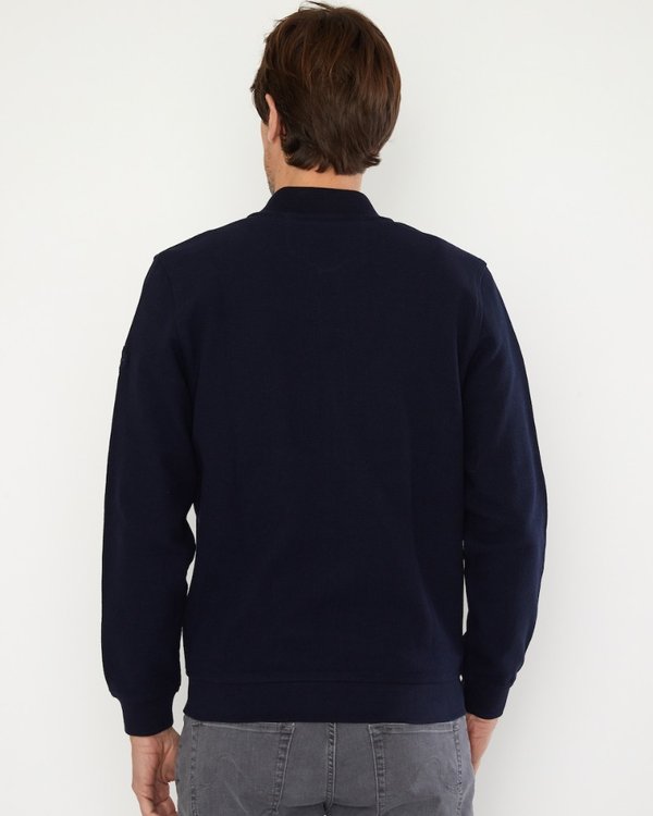 Cardigan zippé manches longues col teddy en coton bleu Cardigan zippé manches longues col teddy en coton bleu