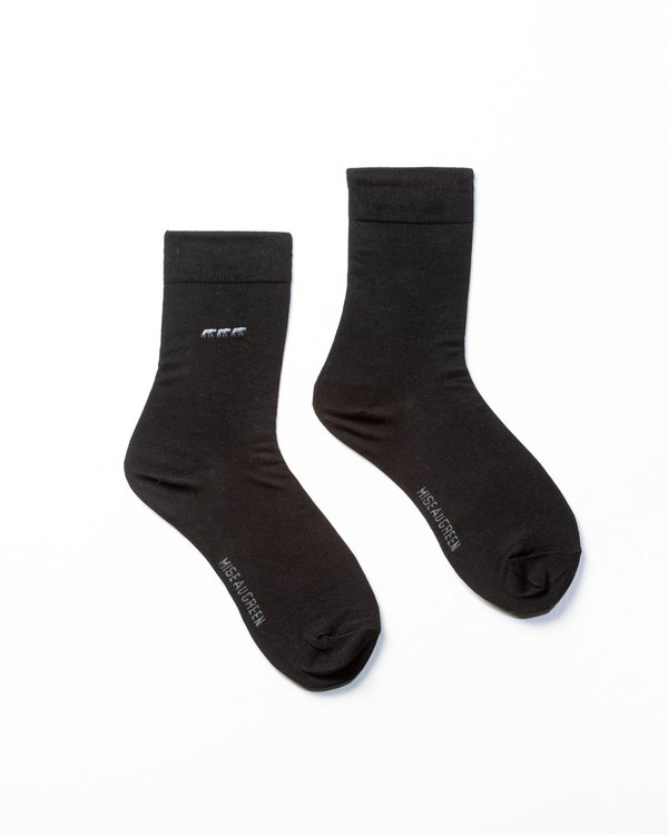 Chaussettes unies broderie 3 vaches noir