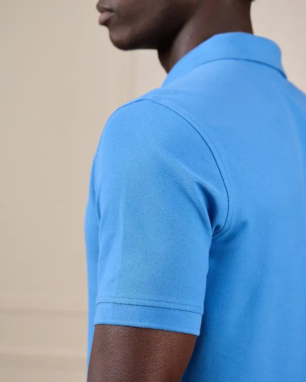 Polo blason bleu