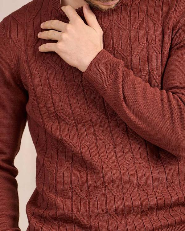 Pull torsadé rouge