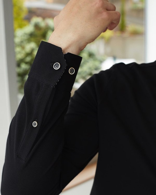 Polo manches longues col chemise quadrillé en coton noir