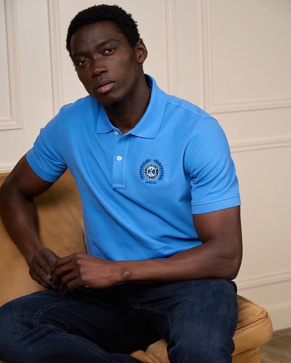 Polo blason bleu