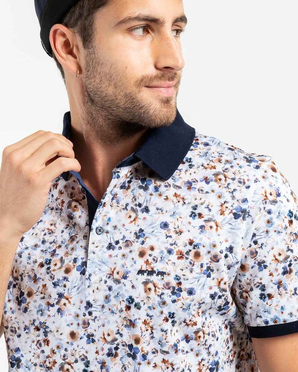 Polo piqué regular fit à manches courtes fleuri en coton blanc