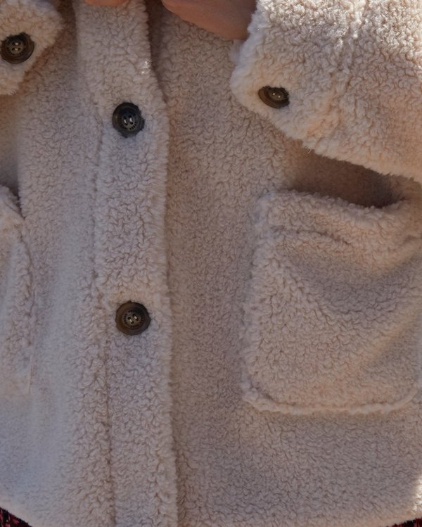 Manteau effet mouton en fausse fourrure uni blanc Manteau effet mouton en fausse fourrure uni blanc