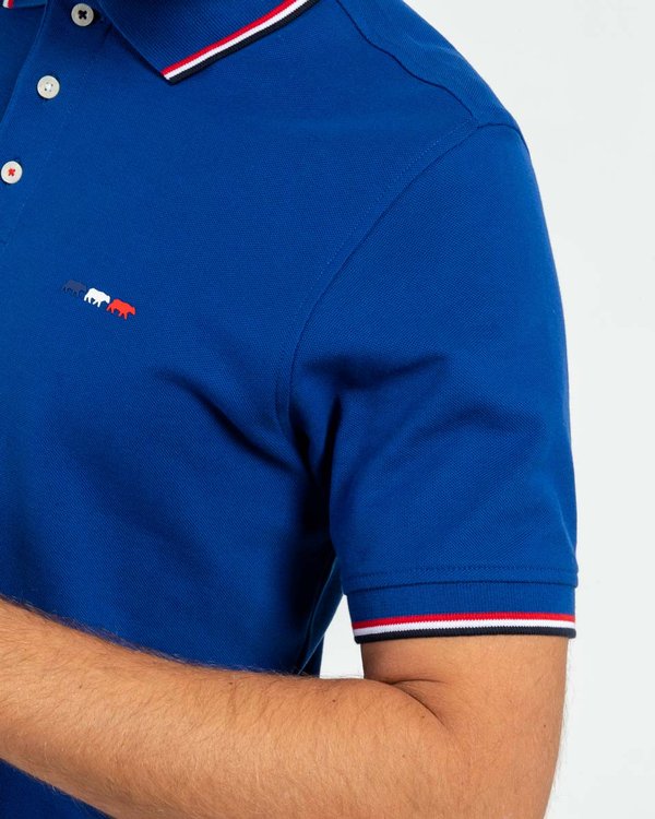 Polo manches courtes détails tricolores en coton bleu Polo manches courtes détails tricolores en coton bleu