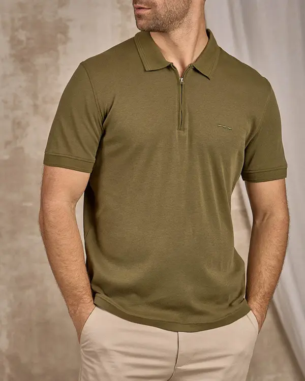 Polo col zippé vert