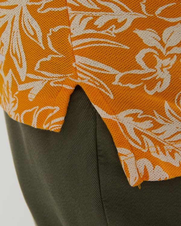 Polo sans manches à fleurs en coton orange