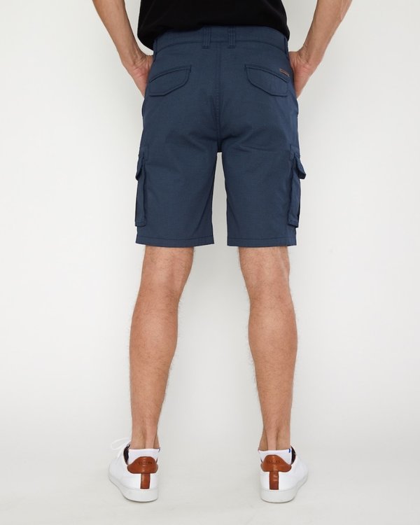 Bermuda faux uni à micro motifs en coton bleu Bermuda faux uni à micro motifs en coton bleu