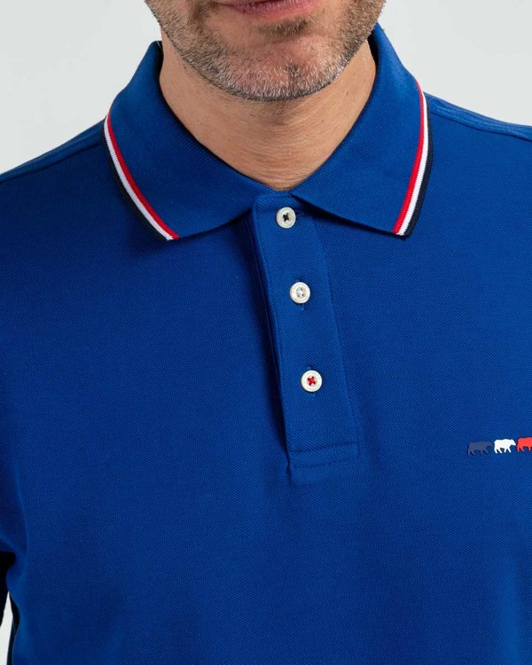 Polo manches courtes détails tricolores en coton bleu Polo manches courtes détails tricolores en coton bleu