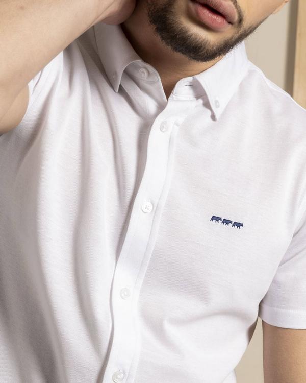 Chemise manches courtes unie broderie trois vaches 100% Coton Chemise manches courtes unie broderie trois vaches 100% Coton