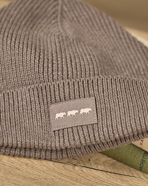 Bonnet en tricot beige Bonnet en tricot beige