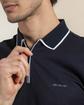Polo col zippé Polo col zippé