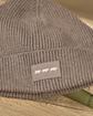 Bonnet en tricot beige Bonnet en tricot beige